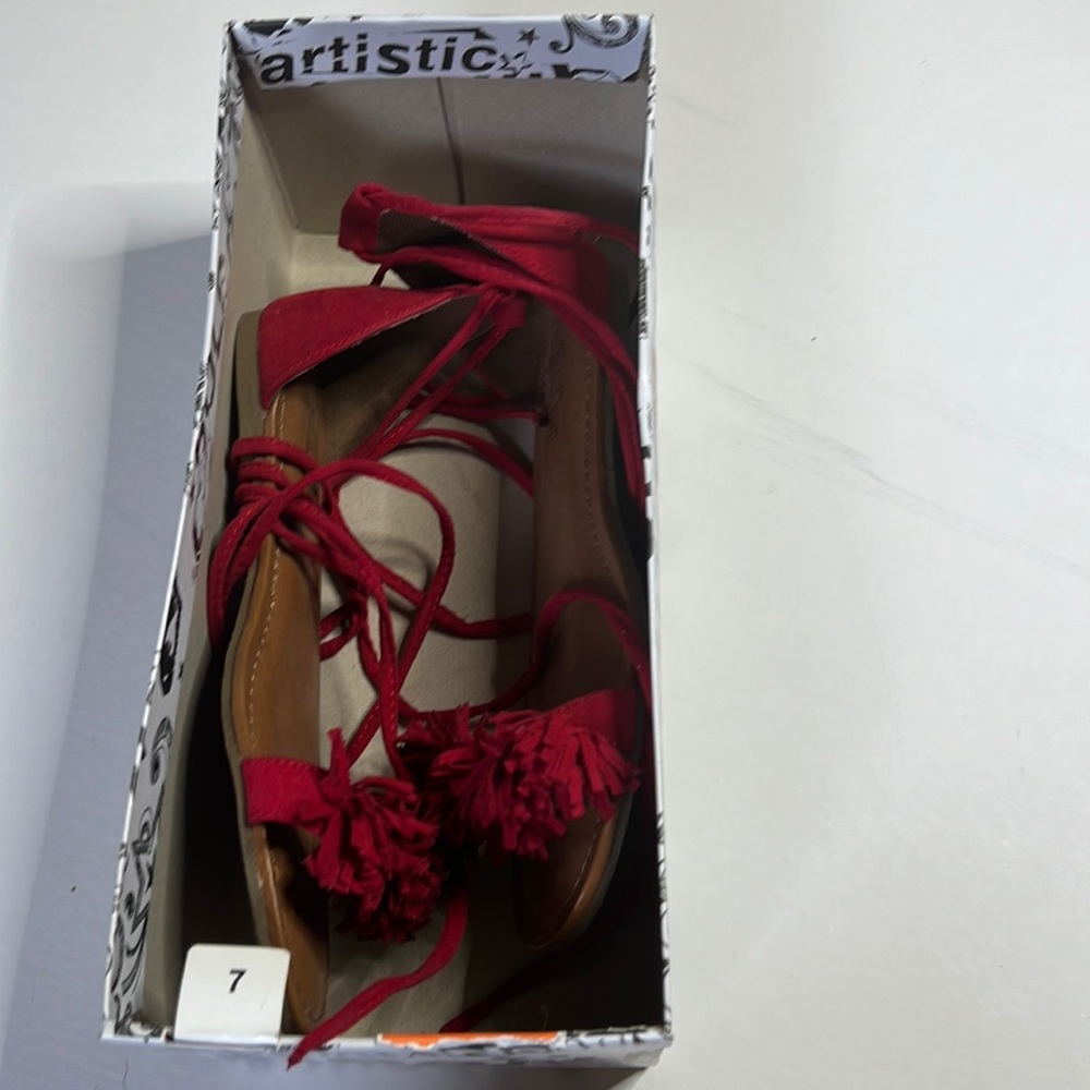 Red flat lace up shoes